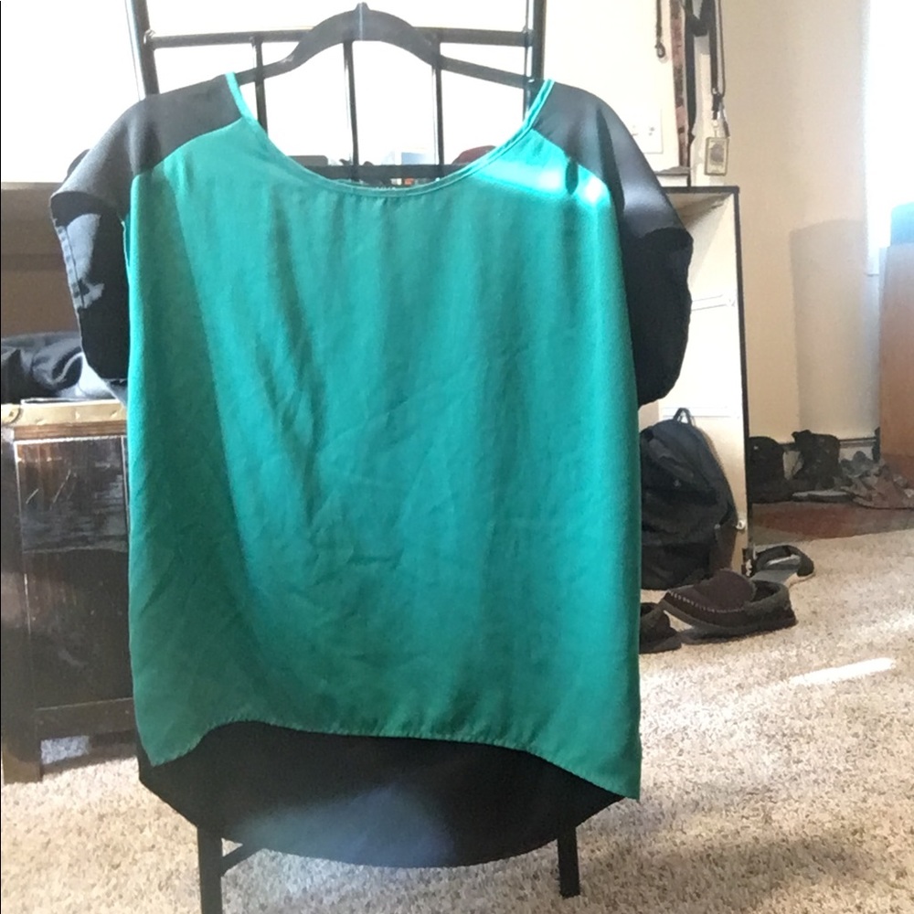 Green and black flowy shirt.